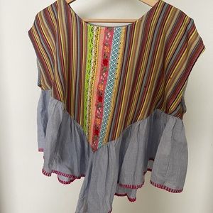 Cropped and flowy blouse